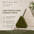 Savon SEOUL 01, galette triangulaire verte et son étui ivoire de 100 g posés sur du marbre